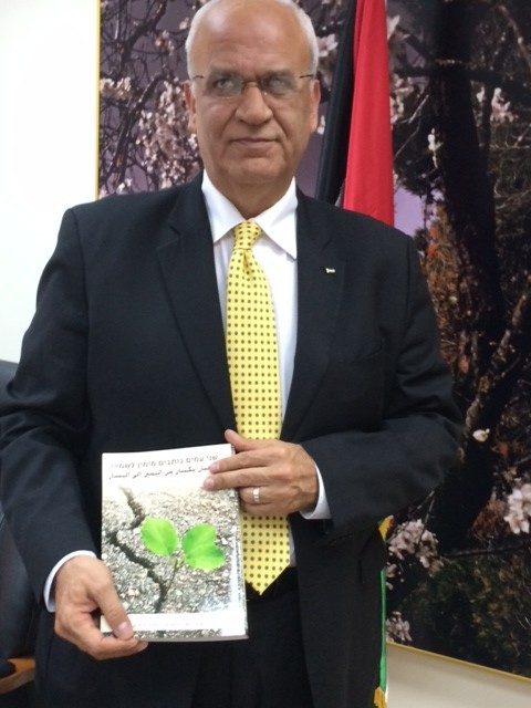 Saeb Erekat holding SFP anthology